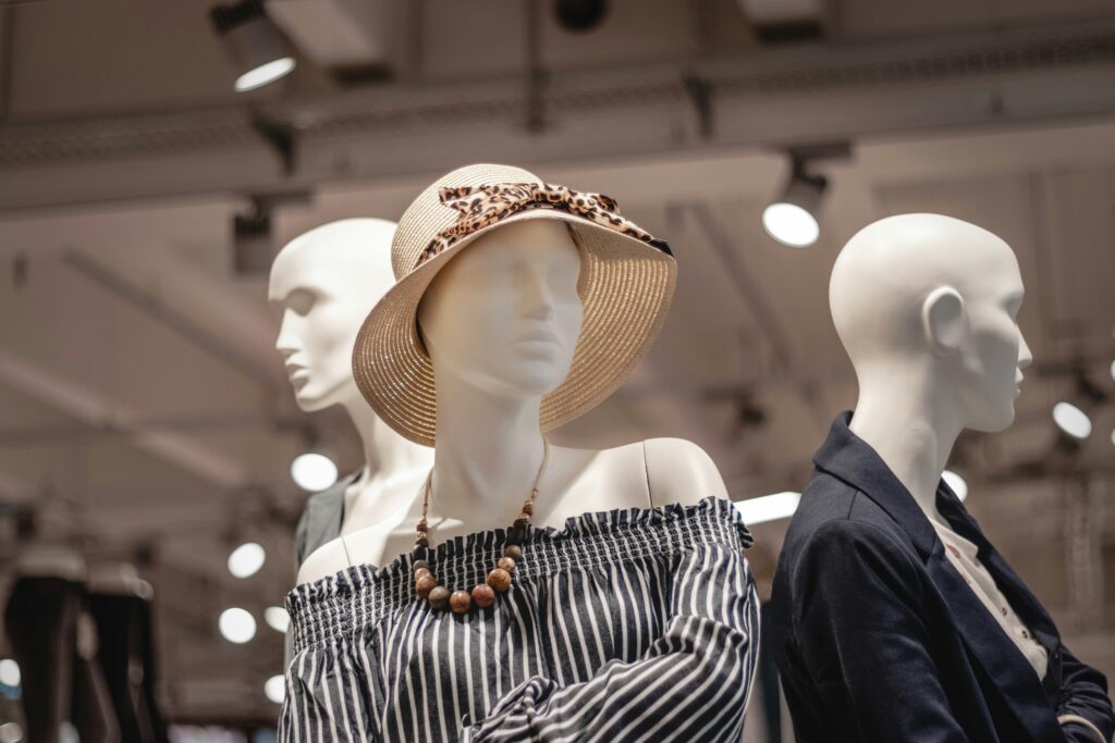 shallow focus photo of mannequin wearing brown sunhat shallow focus photo of mannequin wearing brown sunhat
